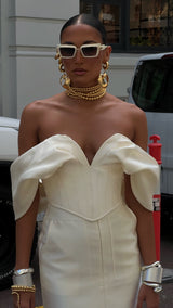 Nina Corset in Ivory White by Khirzad Femme - Elegant ivory white corset with heavy bone detailing, low v neckline with off voluminous off the shoulder sleeves designed for the Khirzad Femme Bridal Collection