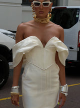 Nina Corset in Ivory White by Khirzad Femme - Elegant ivory white corset with heavy bone detailing, low v neckline with off voluminous off the shoulder sleeves designed for the Khirzad Femme Bridal Collection