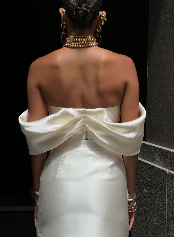 Nina Corset in Ivory White by Khirzad Femme - Elegant ivory white corset with heavy bone detailing, low v neckline with off voluminous off the shoulder sleeves designed for the Khirzad Femme Bridal Collection